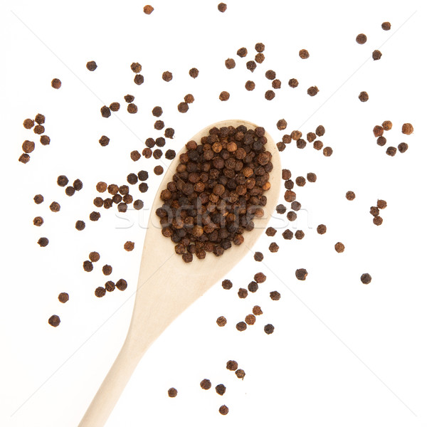 Black pepper on a wooden spoon Stock photo © michaklootwijk