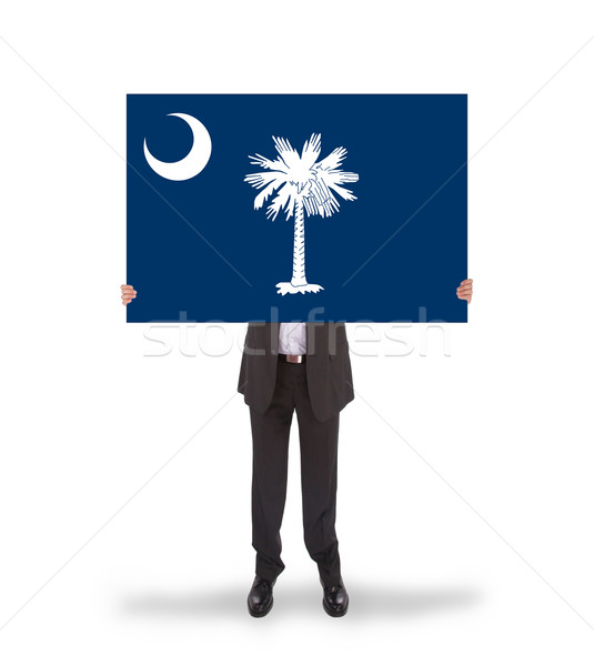 Lächelnd Geschäftsmann halten groß Karte Flagge Stock foto © michaklootwijk