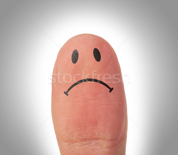 Female thumbs with smile face on the finger Stock photo © michaklootwijk