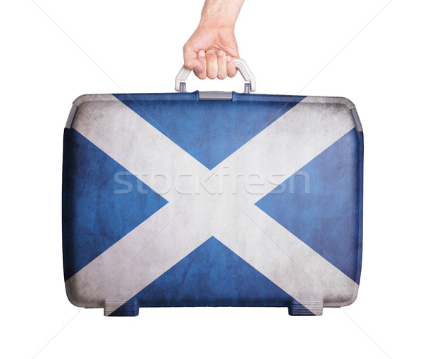 Stock photo: Used plastic suitcase with stains and scratches