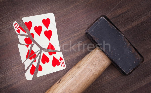 Hammer with a broken card, ten of hearts Stock photo © michaklootwijk