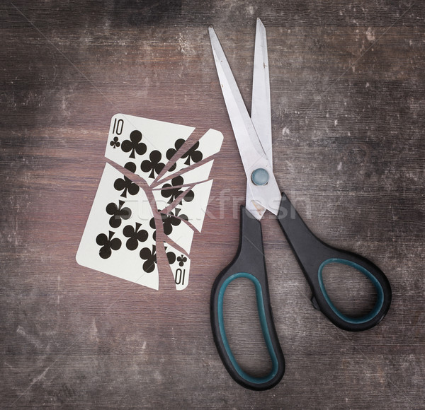 Concept of addiction, card with scissors Stock photo © michaklootwijk