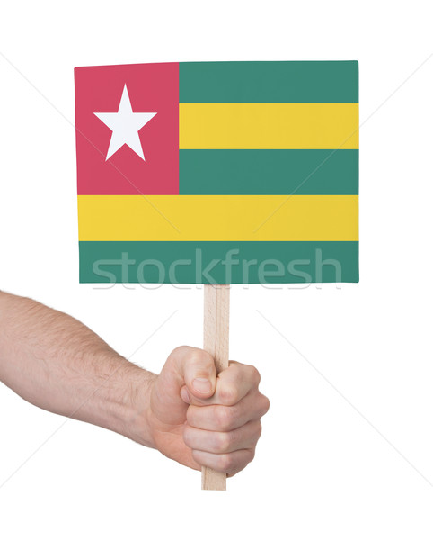 Hand holding small card - Flag of Togo Stock photo © michaklootwijk