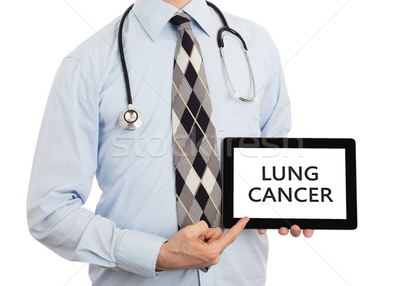 Arzt halten Tablet Lungenkrebs isoliert weiß Stock foto © michaklootwijk