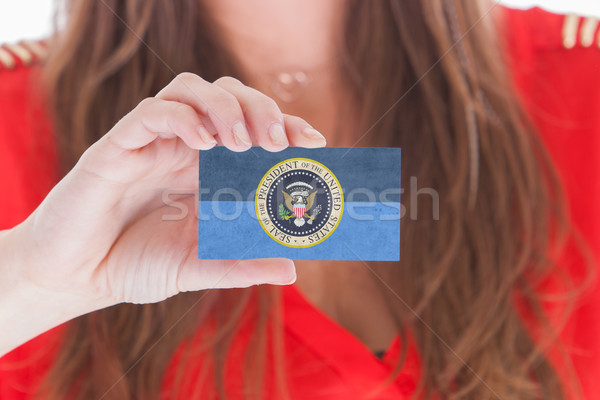 Woman showing a business card Stock photo © michaklootwijk