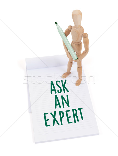 Wooden mannequin writing - Ask an expert Stock photo © michaklootwijk