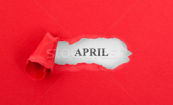 Text appearing behind torn red envelop Stock photo © michaklootwijk