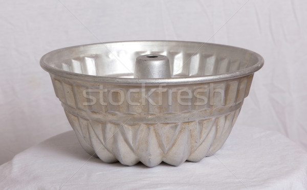 Old fluted tube baking pan isolated Stock photo © michaklootwijk