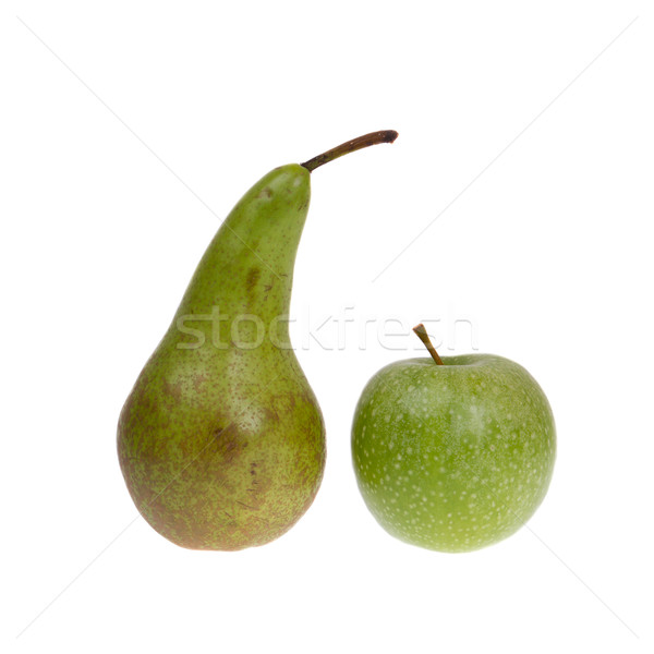 A green pear and a green apple isolated Stock photo © michaklootwijk