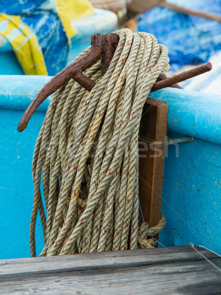 Old rusty anchor on a fishingboat Stock photo © michaklootwijk