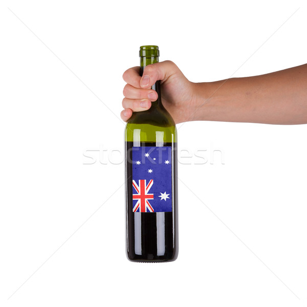 Mână sticlă vin rosu etichetă Australia Imagine de stoc © michaklootwijk
