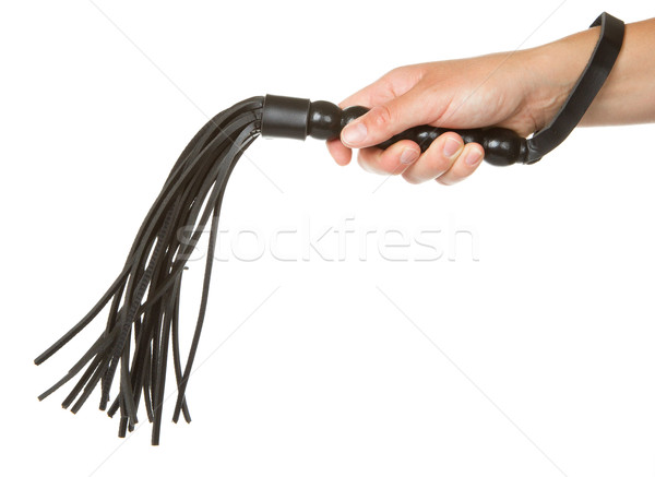 Strict Black Leather Flogging Whip in woman's hand Stock photo © michaklootwijk