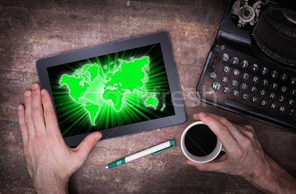 World map on a tablet Stock photo © michaklootwijk