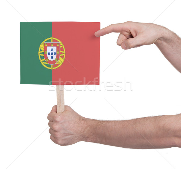 Hand holding small card - Flag of Portugal Stock photo © michaklootwijk