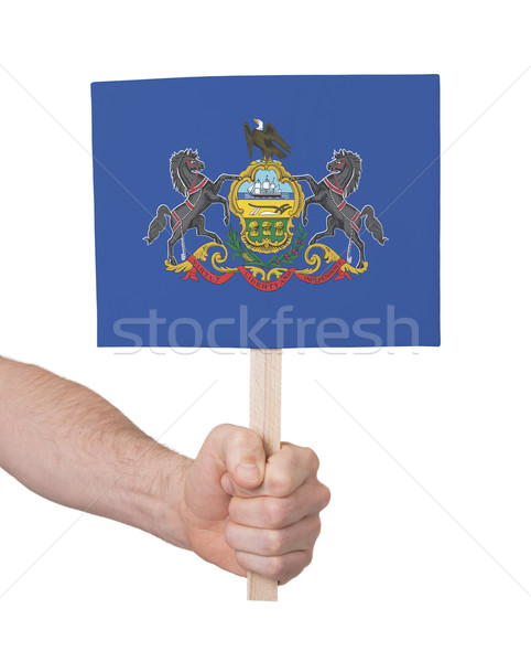 Hand holding small card - Flag of Pennsylvania Stock photo © michaklootwijk