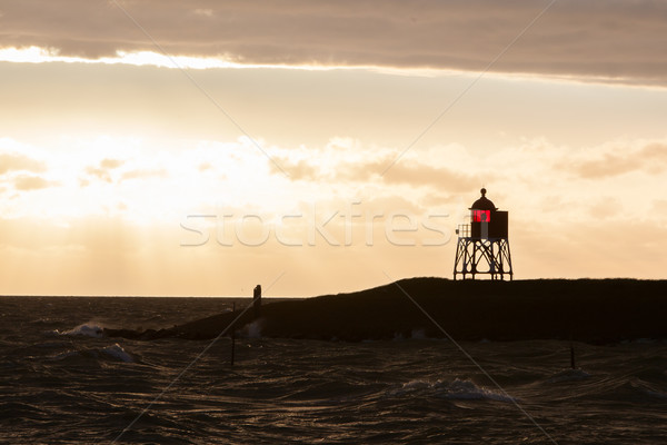 シルエット 赤 ビーコン オランダ語 海岸 日没 ストックフォト © michaklootwijk