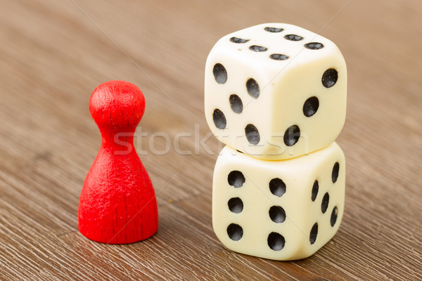One red pawn and two dice Stock photo © michaklootwijk