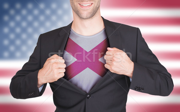 бизнесмен открытие костюм рубашку флаг США Сток-фото © michaklootwijk