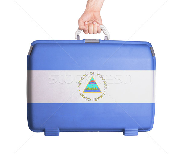 Used plastic suitcase with stains and scratches Stock photo © michaklootwijk