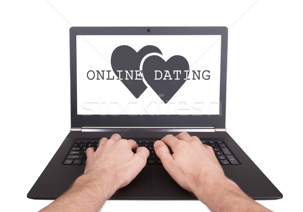 Man werken laptop online dating geïsoleerd Stockfoto © michaklootwijk