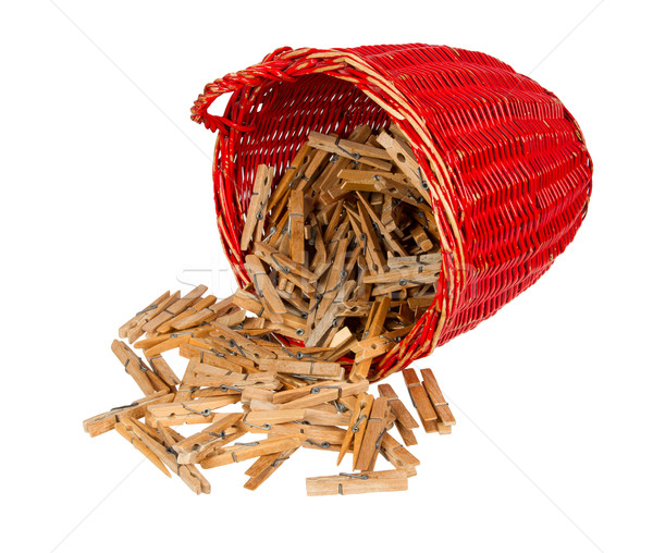 Very old red basket with wooden clothespins Stock photo © michaklootwijk
