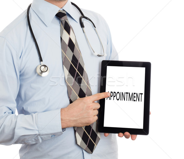 Médico tableta nombramiento aislado blanco Foto stock © michaklootwijk