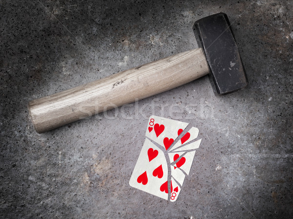 Hammer with a broken card, eight of hearts Stock photo © michaklootwijk
