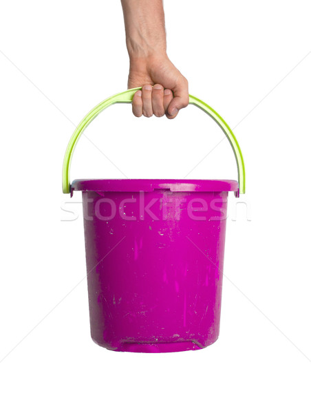 Human hand holding empty plastic pail Stock photo © michaklootwijk