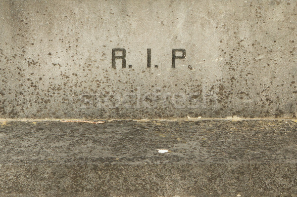 The letters RIP on an old grave Stock photo © michaklootwijk