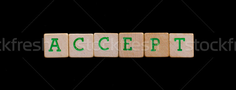Letters on old wooden blocks (accept) Stock photo © michaklootwijk