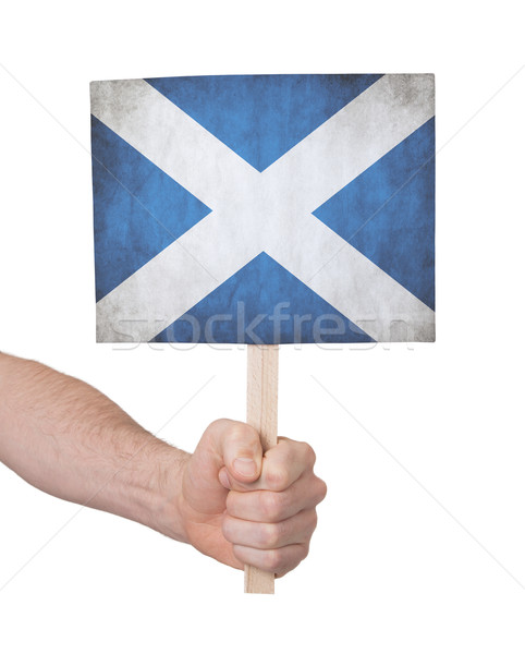 Hand holding small card - Flag of Scotland Stock photo © michaklootwijk
