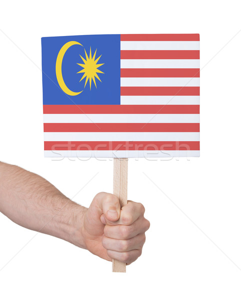 Kéz tart kicsi kártya zászló Malajzia Stock fotó © michaklootwijk