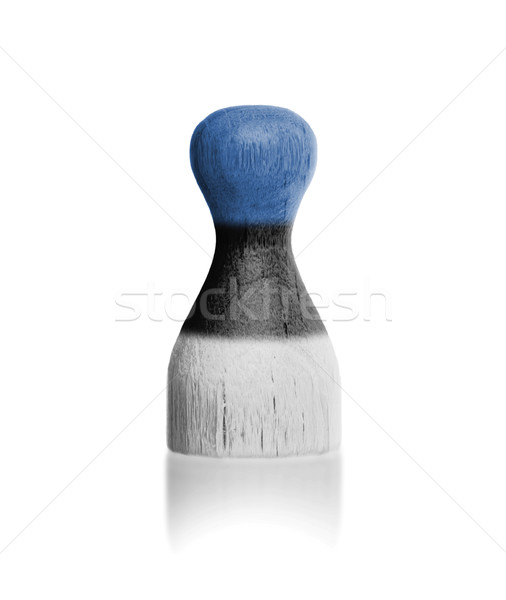 Wooden pawn with a painting of a flag Stock photo © michaklootwijk