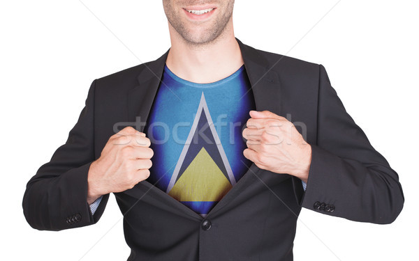 Businessman opening suit to reveal shirt with flag Stock photo © michaklootwijk