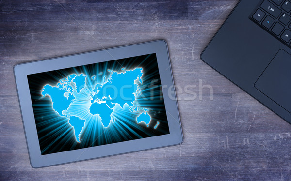 World map on a tablet Stock photo © michaklootwijk