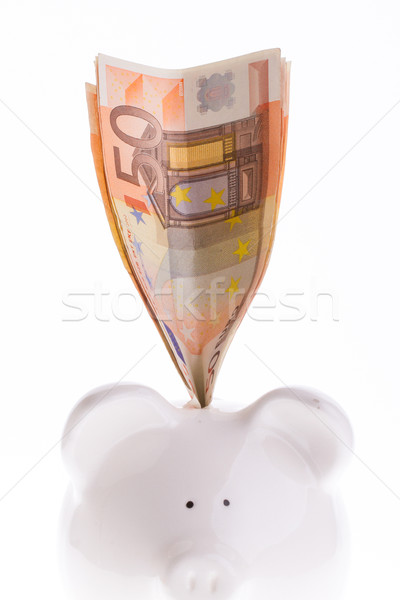 Saving fifty euro in a white money box Stock photo © michaklootwijk