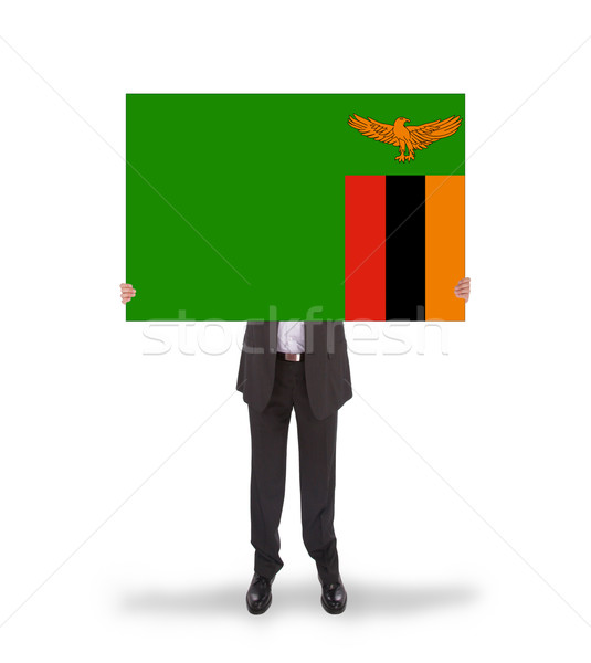 Biznesmen duży karty banderą Zambia Zdjęcia stock © michaklootwijk