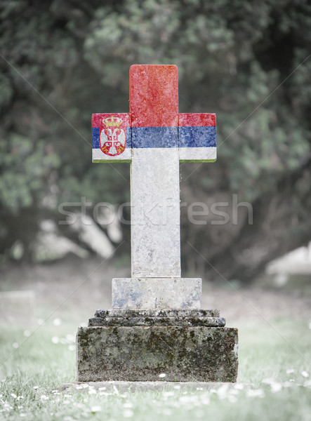Nagrobek cmentarz Serbia starych wyblakły banderą Zdjęcia stock © michaklootwijk