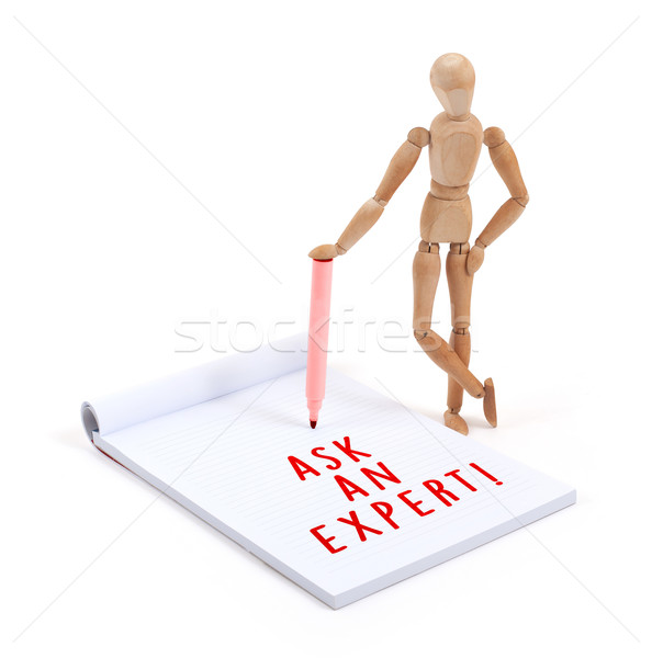 Stock photo: Wooden mannequin writing - Ask an expert