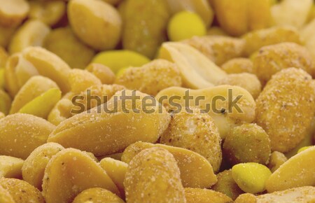 Fresh mixed salted nuts for backgrounds Stock photo © michaklootwijk