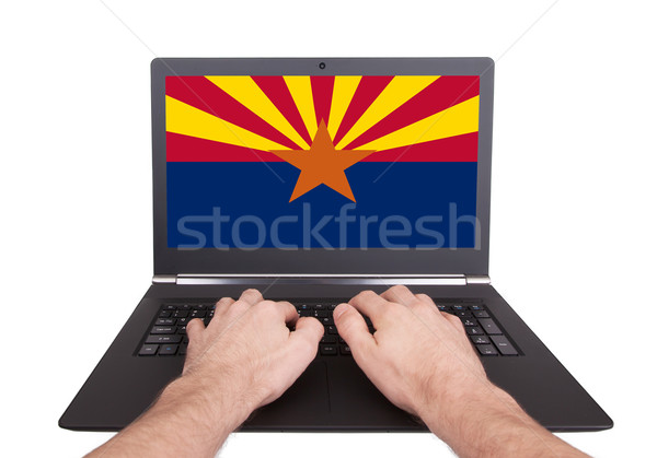 Mãos trabalhando laptop Arizona tela Foto stock © michaklootwijk