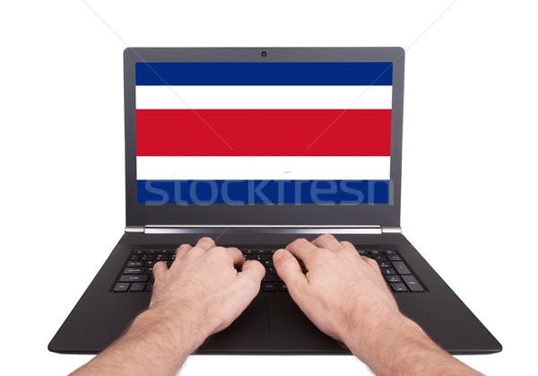 Mãos trabalhando laptop Costa Rica tela Foto stock © michaklootwijk