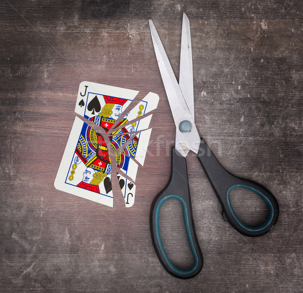 Concept of addiction, card with scissors Stock photo © michaklootwijk