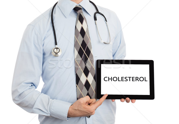 Arzt halten Tablet Cholesterin isoliert weiß Stock foto © michaklootwijk