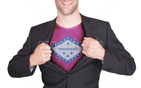 Businessman opening suit to reveal shirt with state flag Stock photo © michaklootwijk