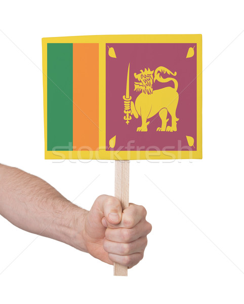 Hand holding small card - Flag of Sri Lanka Stock photo © michaklootwijk