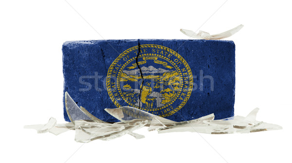 Tijolo cacos de vidro violência bandeira Nebraska parede Foto stock © michaklootwijk