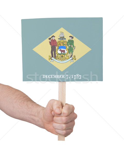 Foto stock: Mano · pequeño · tarjeta · bandera · Delaware