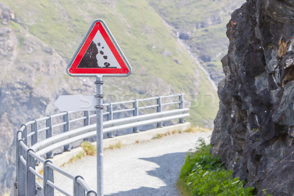 Warning stone fall road sign on mountain road Stock photo © michaklootwijk