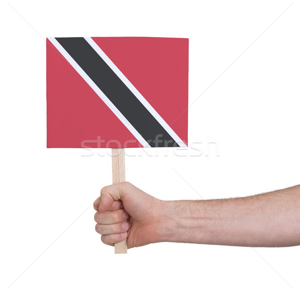 Hand holding small card - Flag of Trinidad and Tobago Stock photo © michaklootwijk